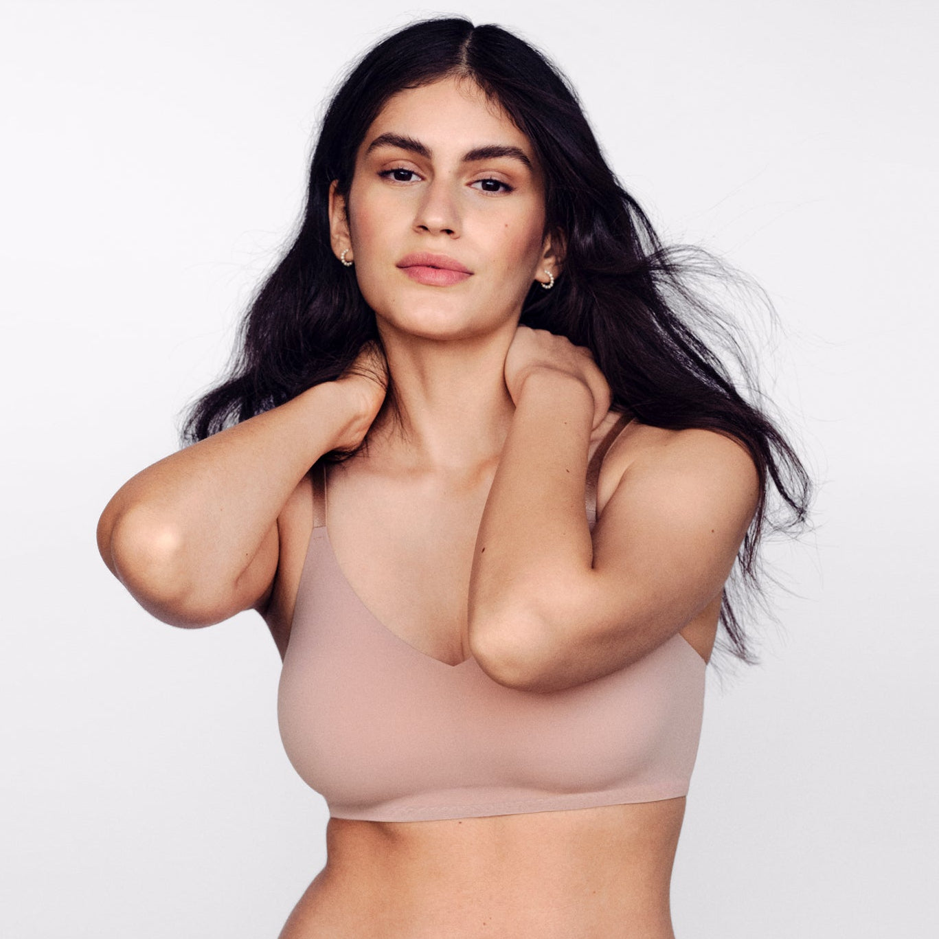 woman wearing pink bra